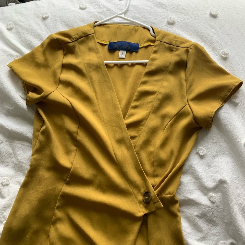 Franchescas mustard yellow jumpsuit with button